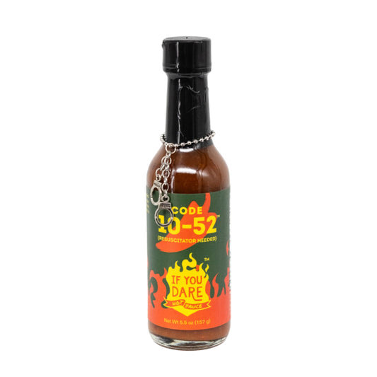 A bottle of Code 10-52 hot sauce with an extreme heat level label, indicating it's made by If You Dare Foods. The bottle is 5 oz.