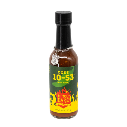 A bottle of Code 10-53 Man Down Hot Sauce with a label that includes flames and text, indicating a hot heat level.